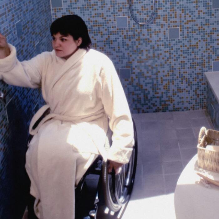 Woman sitting in wheelchair